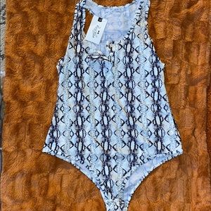 onsie black an white brand new size Large in women